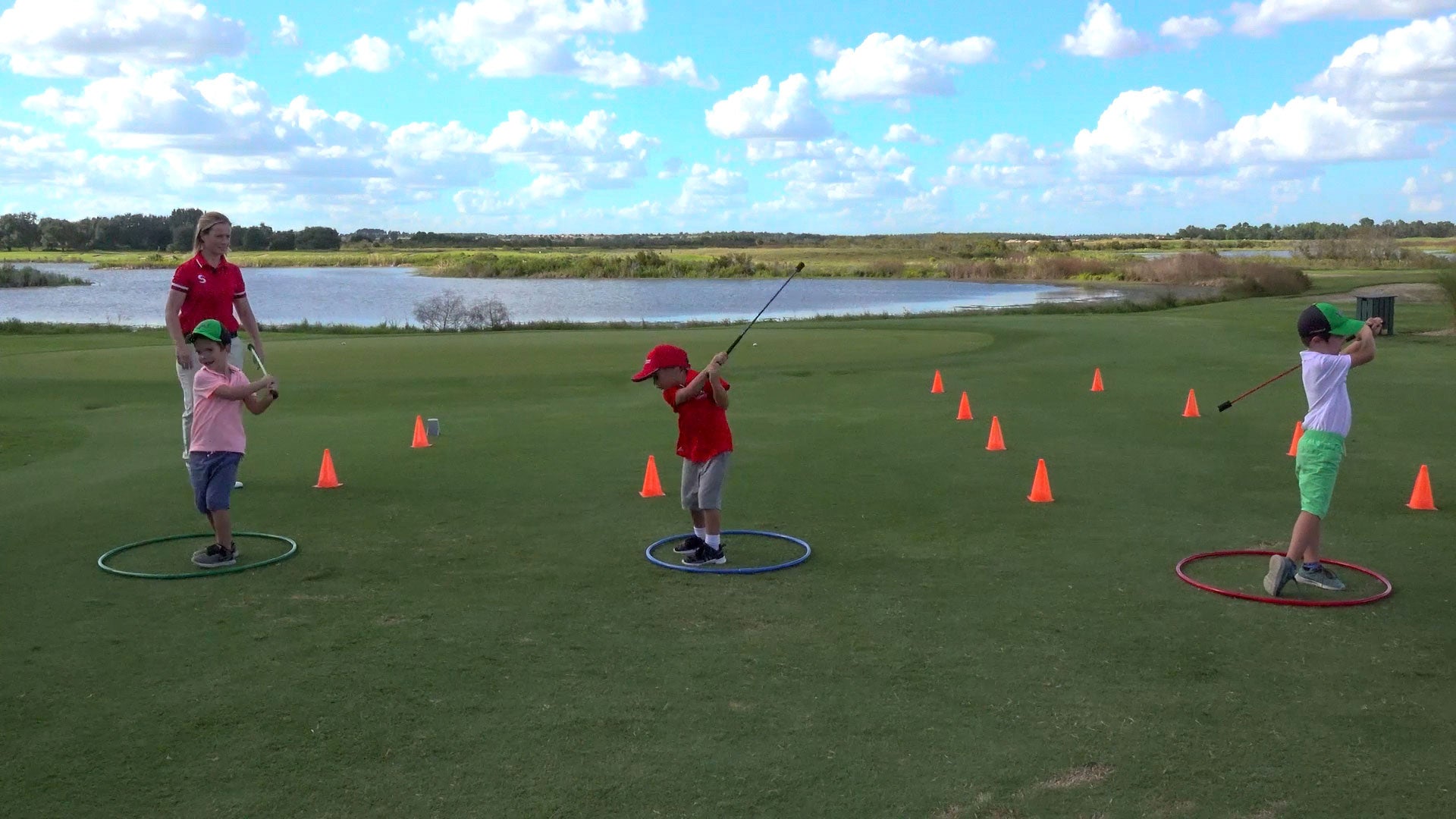Junior golfer training swing speed with SuperSpeed Golf